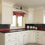 amish-made kitchen cabinets with a window
